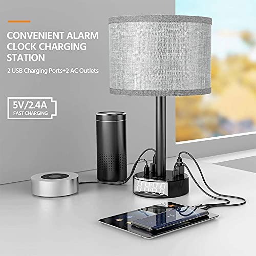 Modern bedside table lamp with digital alarm clock and wireless phone charger on a nightstand