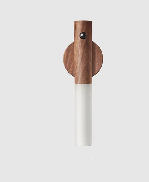 Rechargeable magnetic motion sensor LED night light installed beneath a kitchen cabinet