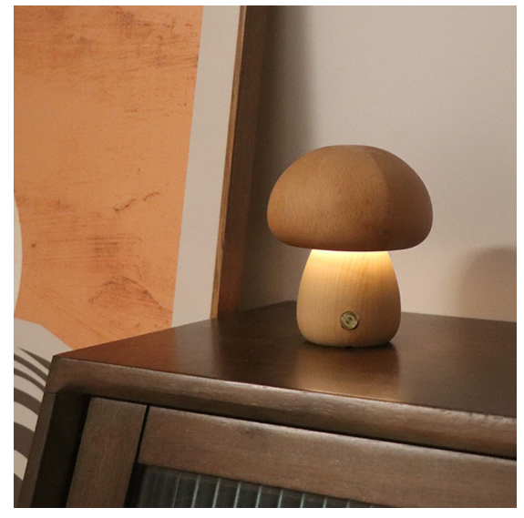 Modern mushroom table lamp with warm LED ambient lighting on a bedside table