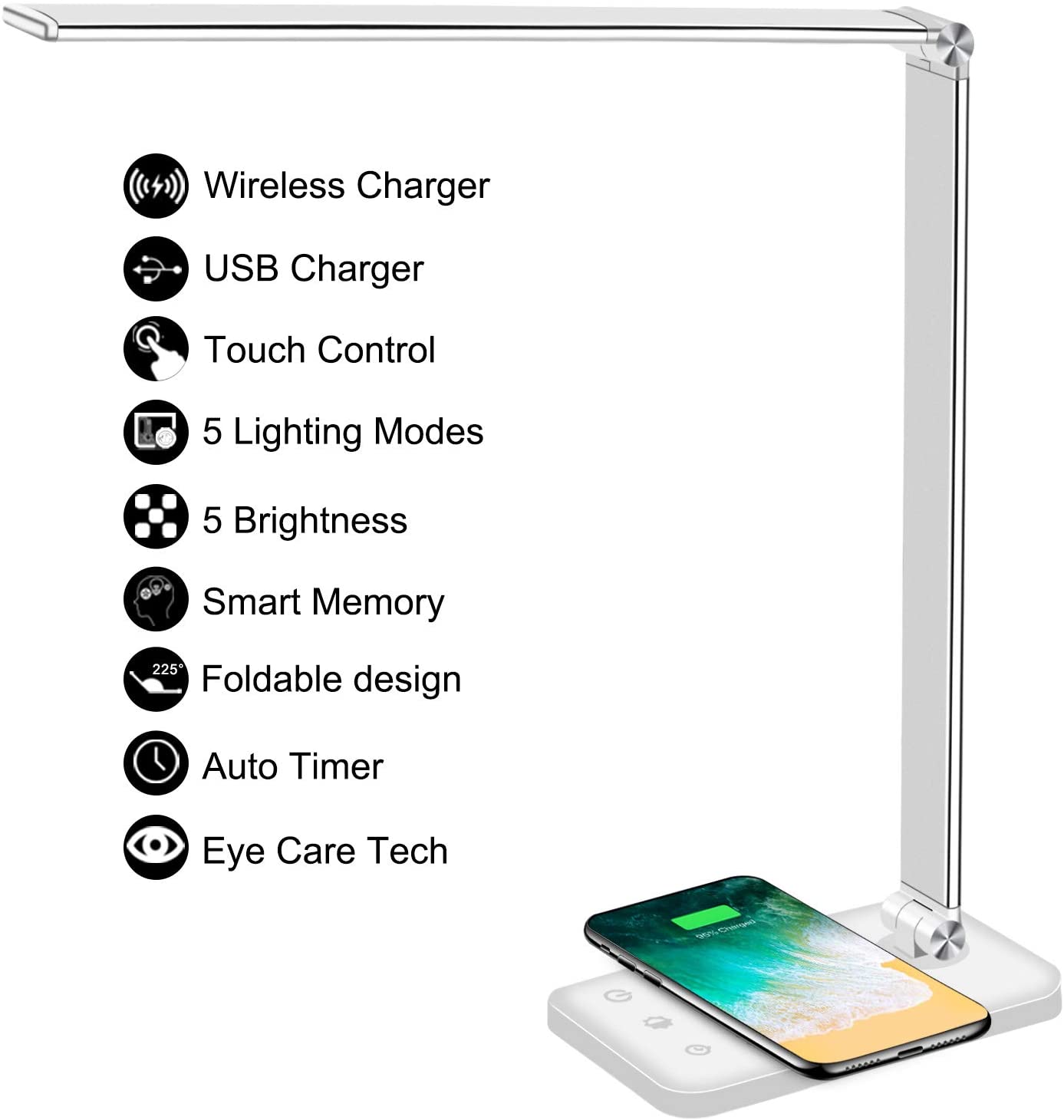 Modern LED desk lamp with wireless phone charger illuminating a minimalist office desk