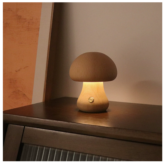 Modern mushroom table lamp with warm LED ambient lighting on a bedside table
