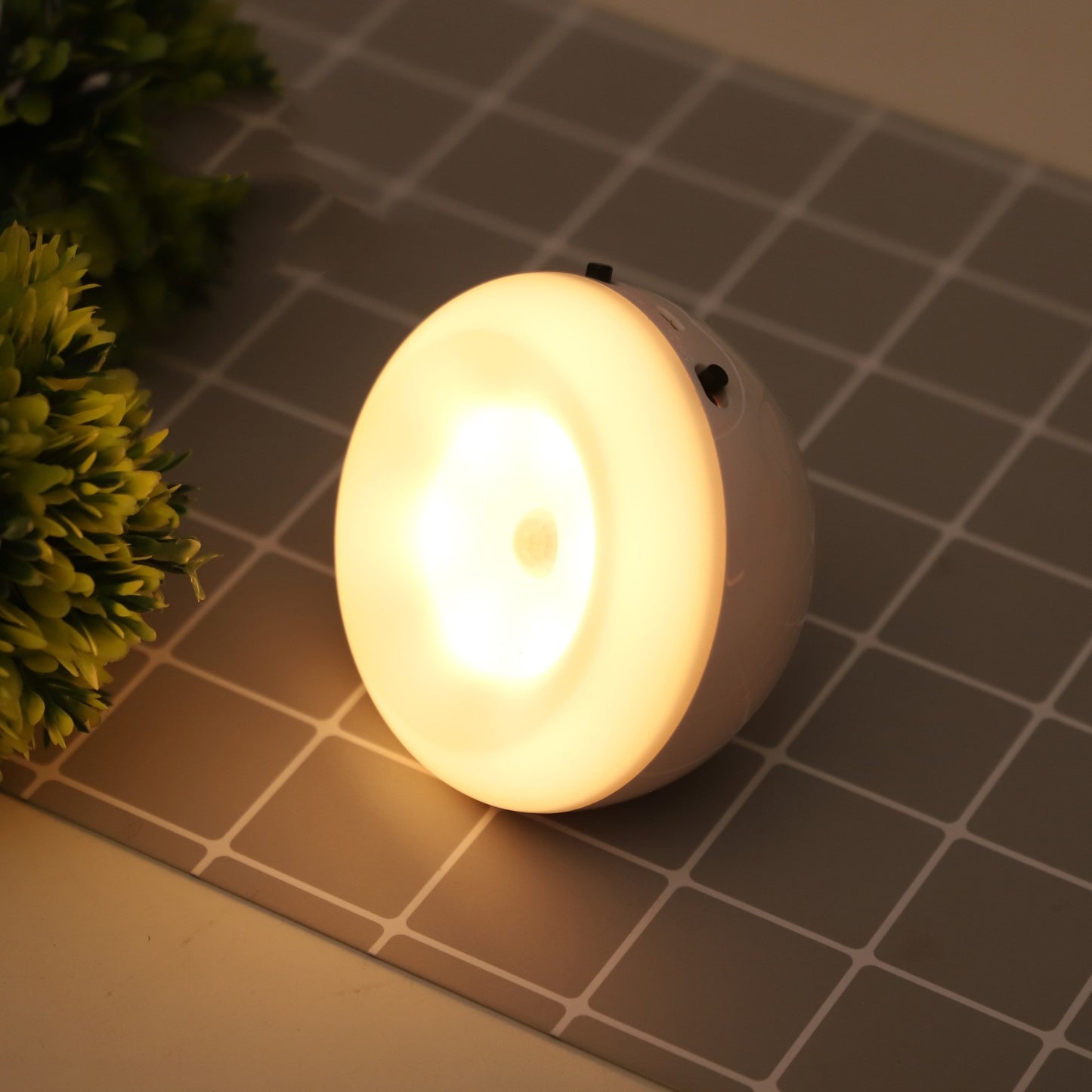 Rechargeable LED motion sensor night light installed inside a wardrobe for automatic illumination