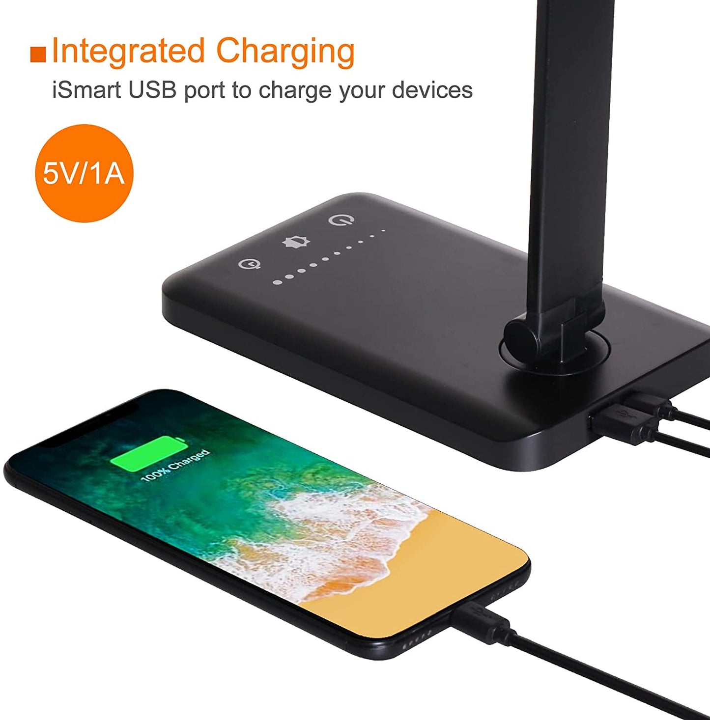 Modern LED desk lamp with wireless phone charger illuminating a minimalist office desk